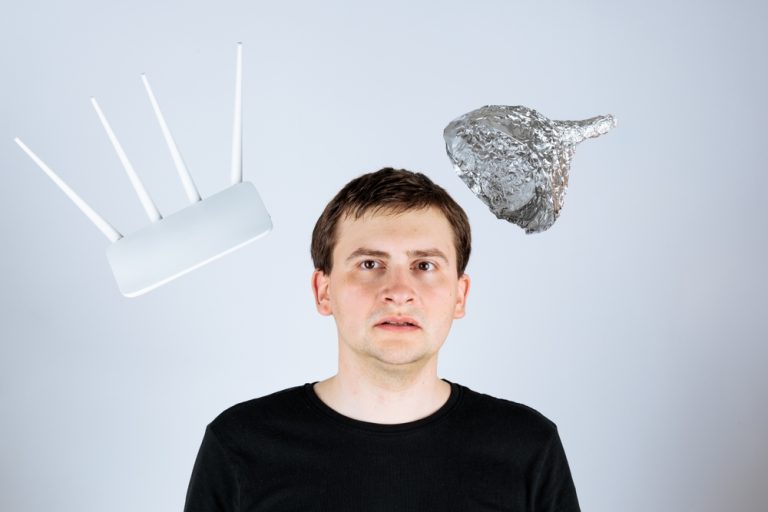 The,person,with,tinfoil,hat,and,5g,router.,he,wonders